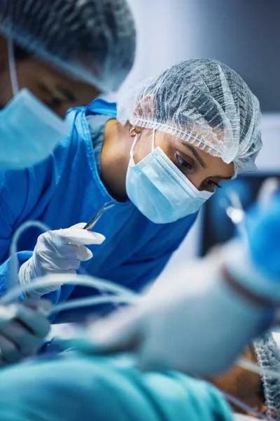 Healthcare Female Surgeon Operating